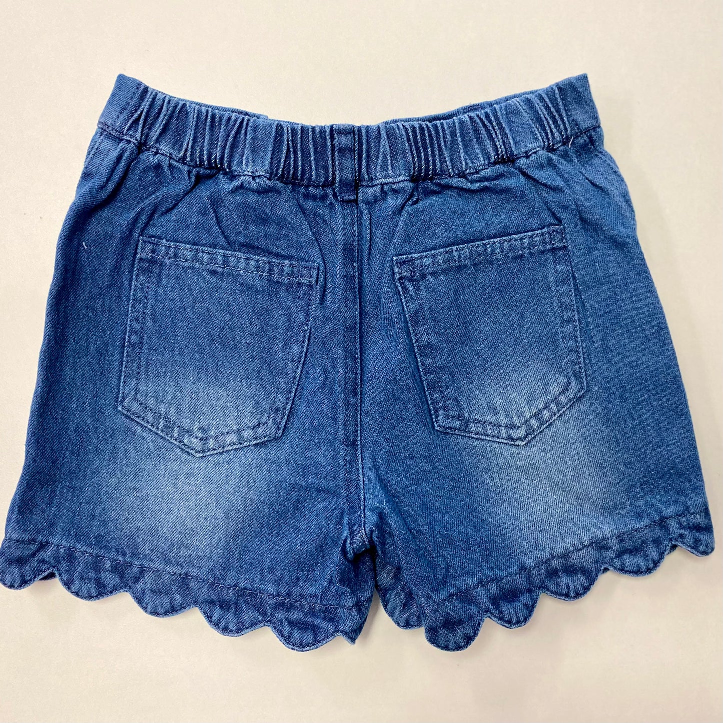 Scalloped bottom denim shorts